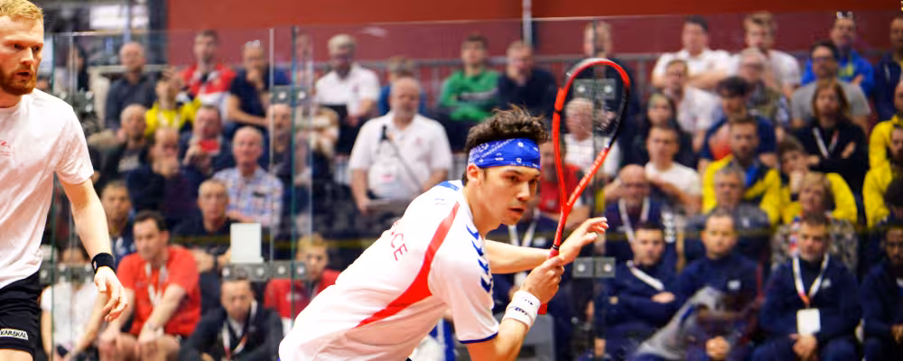 Squash really isn't that hard to learn.  Just try to learn with a caoch if you can.